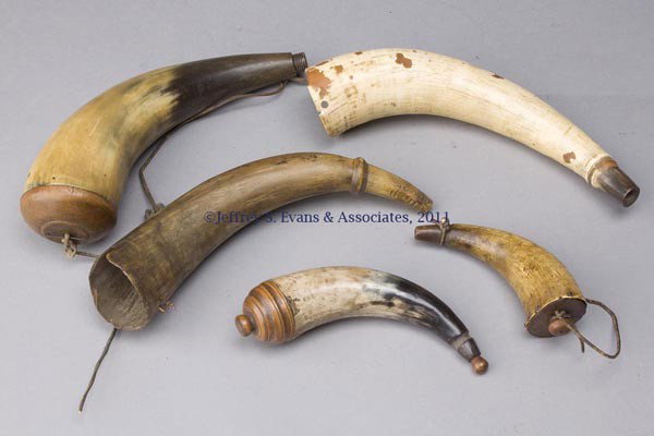 FIVE POWDER HORNS: FIVE POWDER HORNS, one flat and two turned wooden caps. 19th century. 6" to 11 1/2" L. Provenance: Collection of Allison and the late Donald Messerley, Linville, VA. Found in the Shenandoah Valley of 