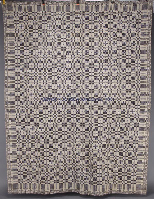 AMERICAN DOUBLE WEAVE COVERLET: AMERICAN DOUBLE WEAVE COVERLET, blue and white, Snowball with Pine Tree border, single panel. Mid 19th century. 77" x 102".