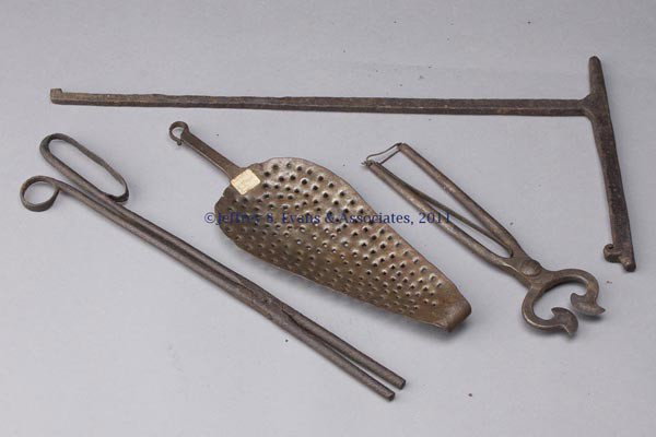 FOUR WROUGHT-IRON DOMESTIC ARTICLES: FOUR WROUGHT-IRON DOMESTIC ARTICLES, including sugar nippers, small crane, and tongs. 19th century. 11 1/2" to 22 1/2" L. Provenance: Estate collection of Dorothy and Marshall Jenkins.