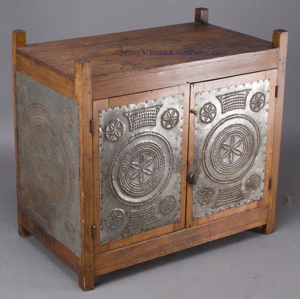 PENNSYLVANIA SOFTWOOD HANGING PIE SAFE: PENNSYLVANIA SOFTWOOD HANGING PIE SAFE, pegged post-and-rail frame with two doors, each door and end set with tin panels featuring hand-punched six-petal rosettes and concentric circles. Interior with