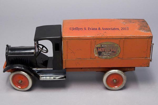 KEYSTONE PRESSED STEEL "PACKARD" MOVING TOY TRUCK: KEYSTONE PRESSED STEEL "PACKARD" MOVING TOY TRUCK enclosed cab with hinged signal at drivers door, cargo bed with double hinged doors and non-original lock and key, solid metal wheels and tires with o