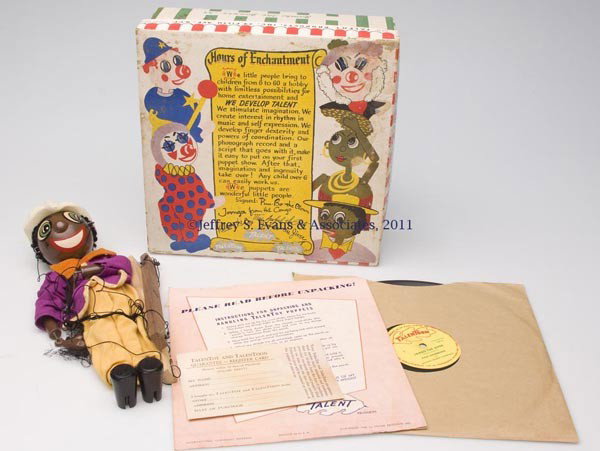 BLACK AMERICANA TALENTOY PUPPET: BLACK AMERICANA TALENTOY PUPPET with original "Jambo The Jiver" 78-rpm record, instructions, and box. Talent Products, Inc. 1948. Box 10 1/2" SQ. Provenance: Estate collection of Dorothy and Marshall 