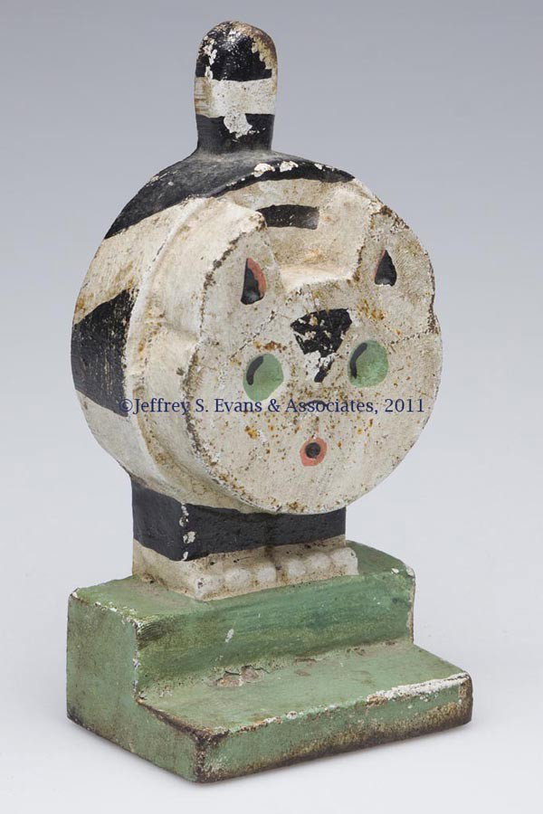 ART DECO CAT CAST-IRON CHILD'S DOORSTOP: ART DECO CAT CAST-IRON CHILD'S DOORSTOP half figure with wedge, original paint. Casting is slightly different from the Hubley example. Unknown age. 6" H, 3" W.