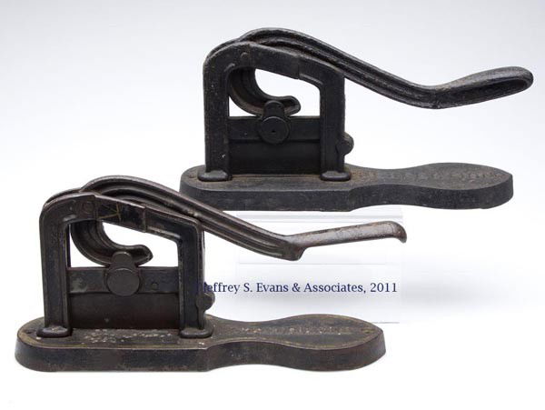TWO CAST-IRON TOBACCO CUTTERS: TWO CAST-IRON TOBACCO CUTTERS one marked "STANDARD" with traces of paint decoration, the other marked "PERFECTION". Second half 19th century. 12 1/2" and 12 1/4" LOA.