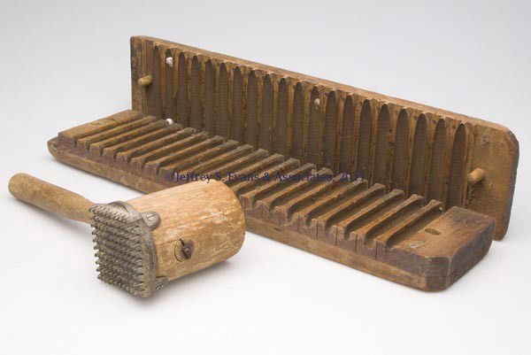 ASSORTED WOODEN COUNTRY STORE ARTICLES, LOT OF TWO: ASSORTED WOODEN COUNTRY STORE ARTICLES, LOT OF TWO comprising a two-part cigar mold and a handled meat tenderizer. Late 19th/early 20th century. 22" and 12" L. Provenance: Estate collection of Dorothy