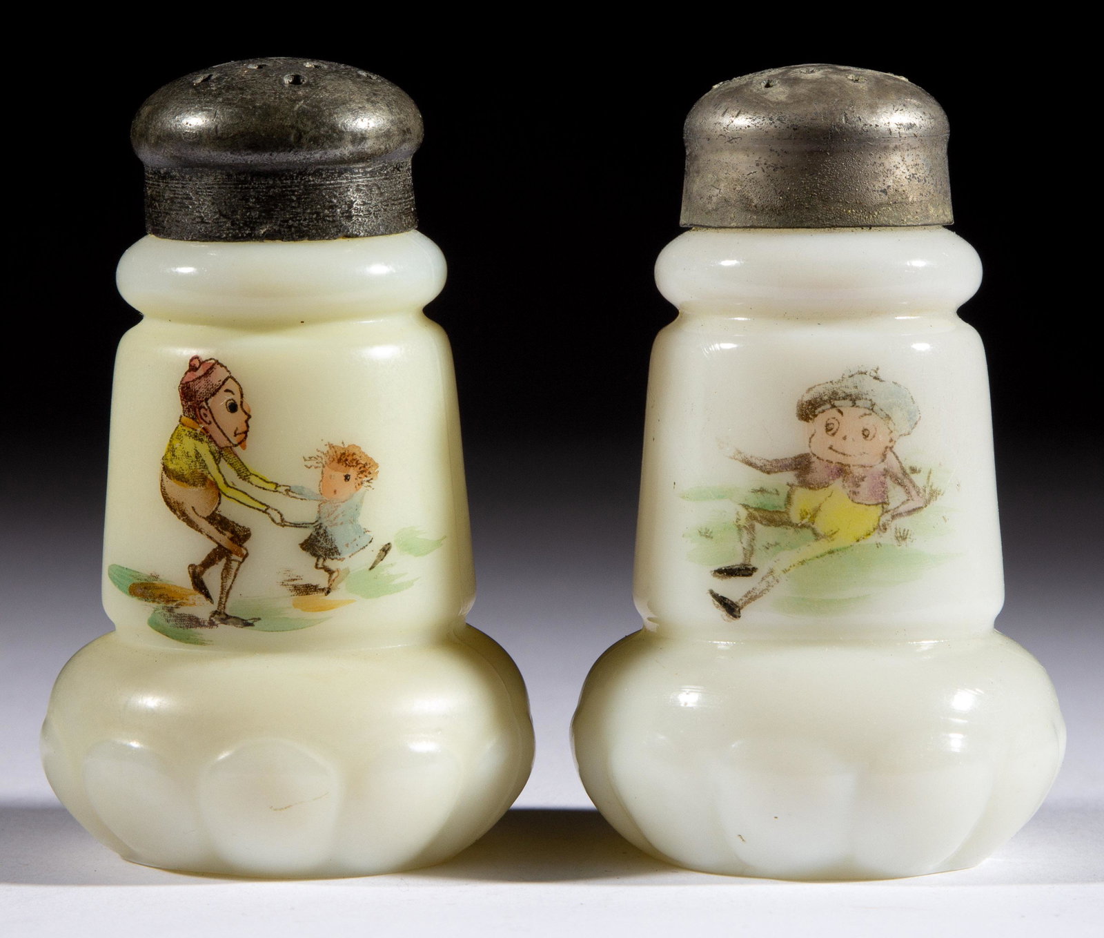 MT. WASHINGTON EGG - PALMER COX BROWNIE SALT AND PEPPER SHAKER,: MT. WASHINGTON EGG - PALMER COX BROWNIE SALT AND PEPPER SHAKER,opaque white with polychrome-enamel decoration,each being a tall Pillar with brownie decoration, each having a period lid.Mt. Washington