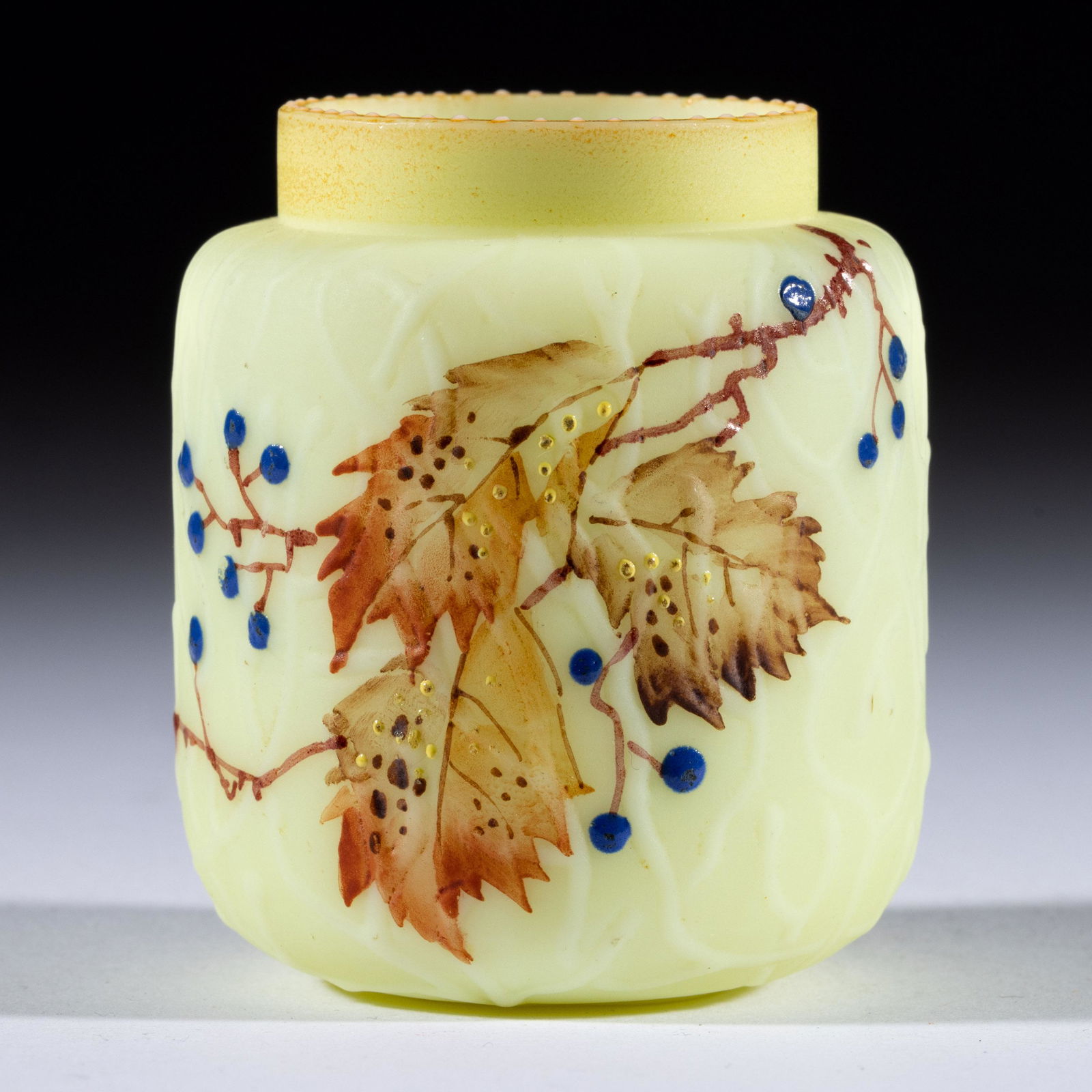 MT. WASHINGTON SPIDER WEB TOOTHPICK HOLDER,: MT. WASHINGTON SPIDER WEB TOOTHPICK HOLDER,custard with polychrome-enamel decoration,beaded rim, Oak Leaf decoration.Mt. Washington Glass Co.Circa 1890.2 1/2" H. Literature: Bredehoft/Sanford - Glass