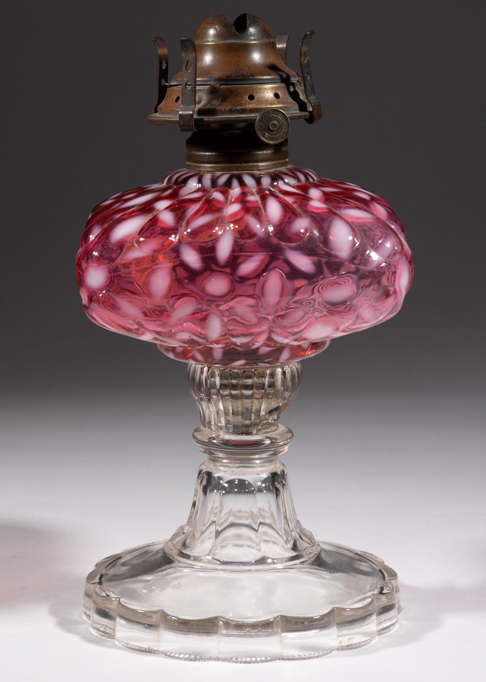 HOBBS NO. 341 / SNOWFLAKE KEROSENE STAND LAMP,: HOBBS NO. 341 / SNOWFLAKE KEROSENE STAND LAMP, Ruby/cranberry opalescent font, colorless base,metal screw connector with original glass sleeve, No. 2 Taplin-Brown collar. Fitted with a period No. 2 sl