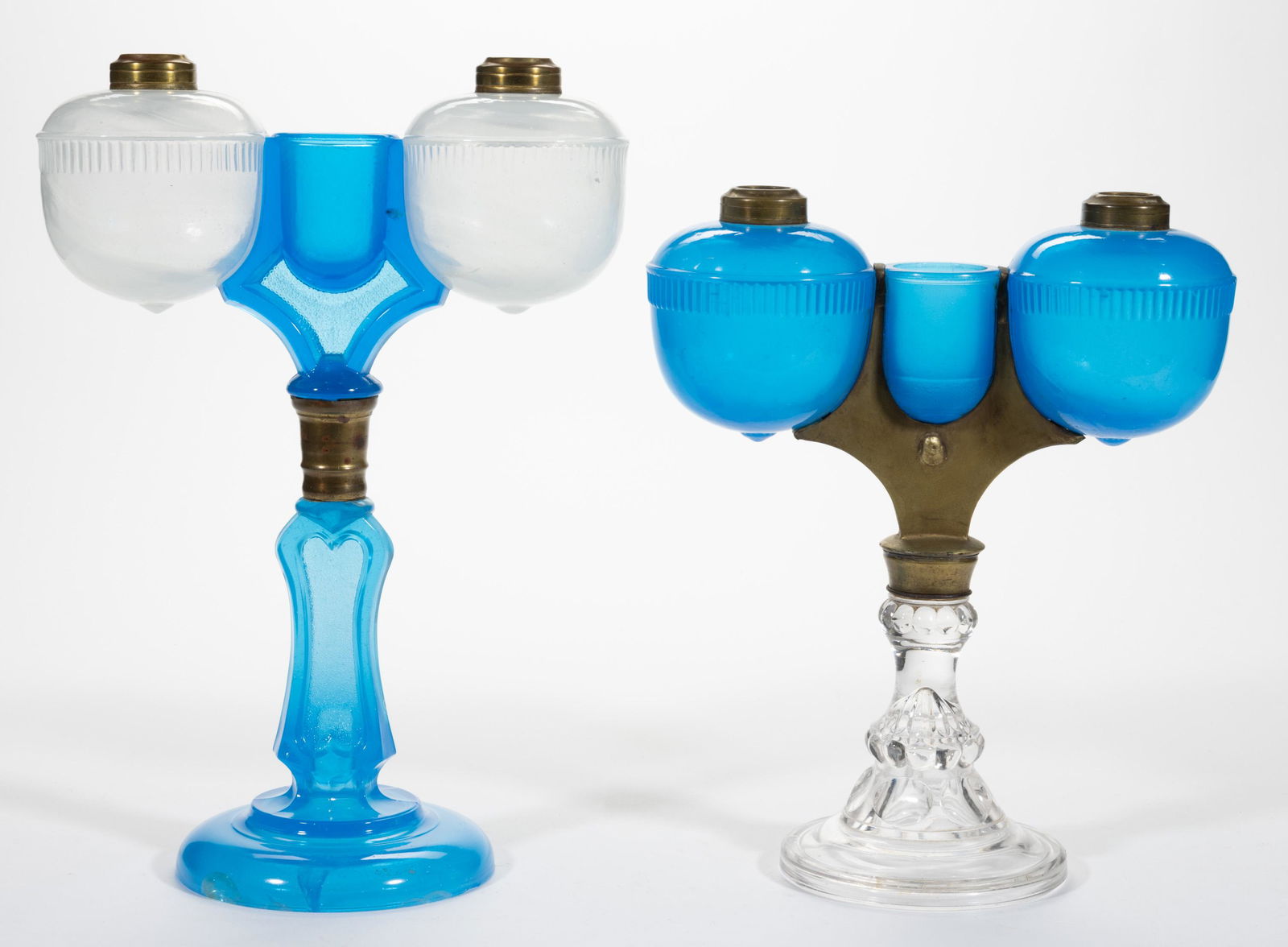 RIPLEY MARRIAGE / WEDDING KEROSENE STAND LAMPS, LOT OF TWO,: RIPLEY MARRIAGE / WEDDING KEROSENE STAND LAMPS, LOT OF TWO,translucent starch blue and alabaster/clambroth,comprising one with an incorrect colorless base and brass covering case; other having a tall