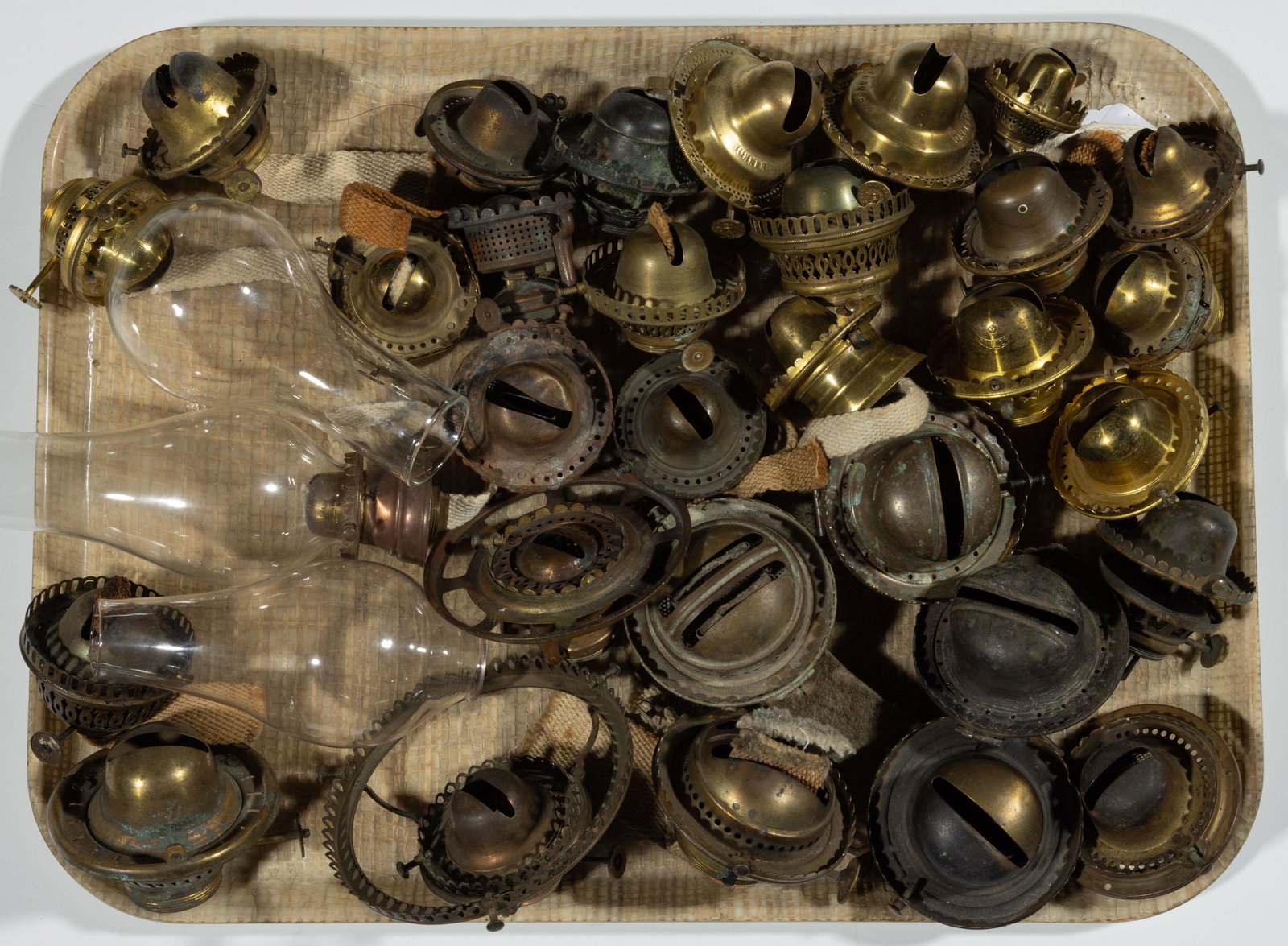 ASSORTED SIZES KEROSENE LIP LAMP BURNERS, LOT OF 32: ASSORTED SIZES KEROSENE LIP LAMP BURNERS, LOT OF 32,mostly brass examples, various manufacturers including Drummond, E. Miller & Co., a Holmes, Booth & Haydens E. F. Jones example, two P & A duplex ex