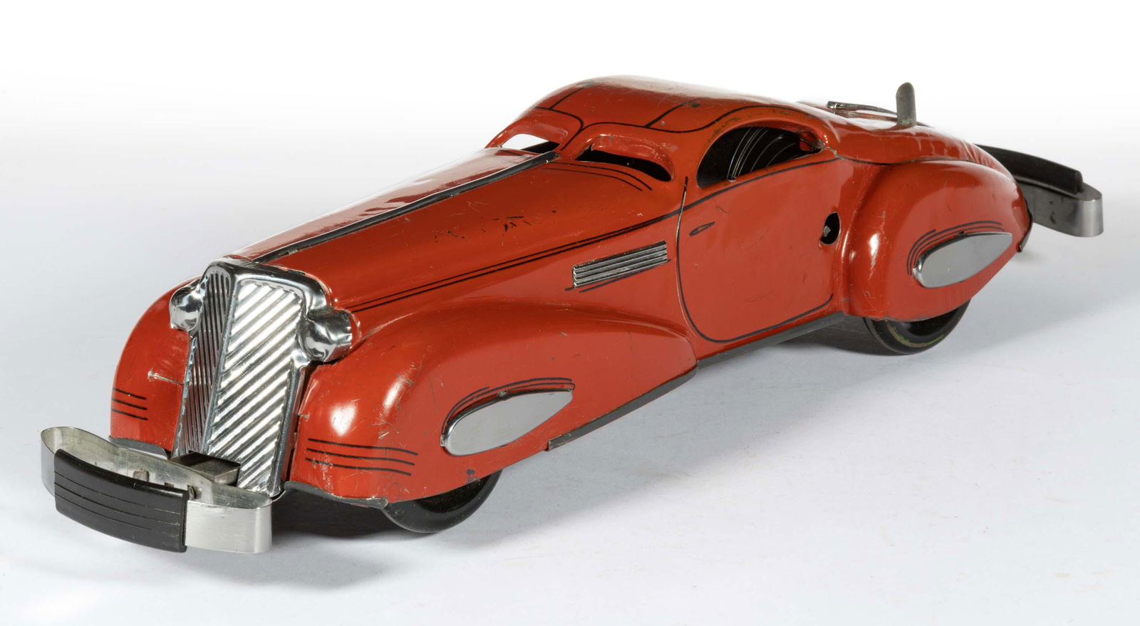 LOUIS MARX & CO. LITHOGRAPHED "REVERSIBLE COUP" PRESSED-STEEL WIND-UP TOY CAR (1 of 3)