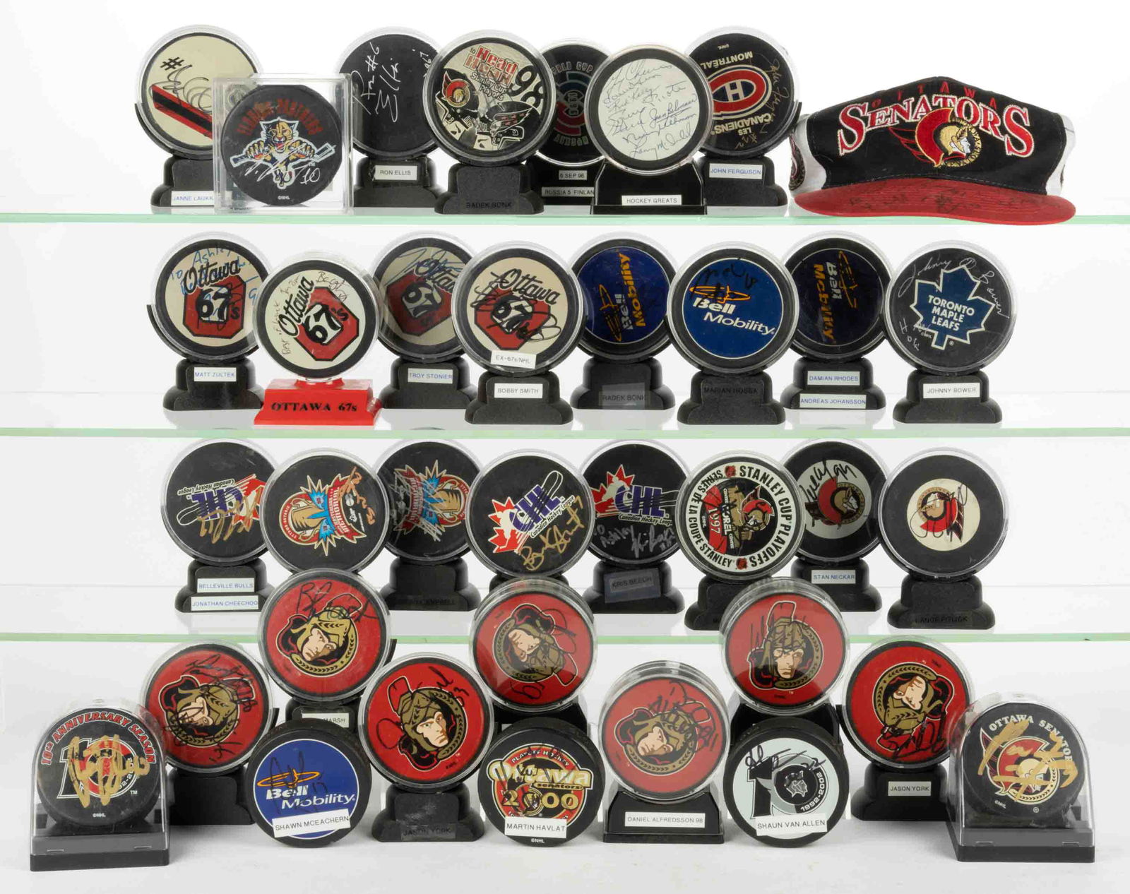ASSORTED VINTAGE AND CONTEMPORARY AUTOGRAPHED HOCKEY PUCK COLLECTION, LOT OF 34 (1 of 7)