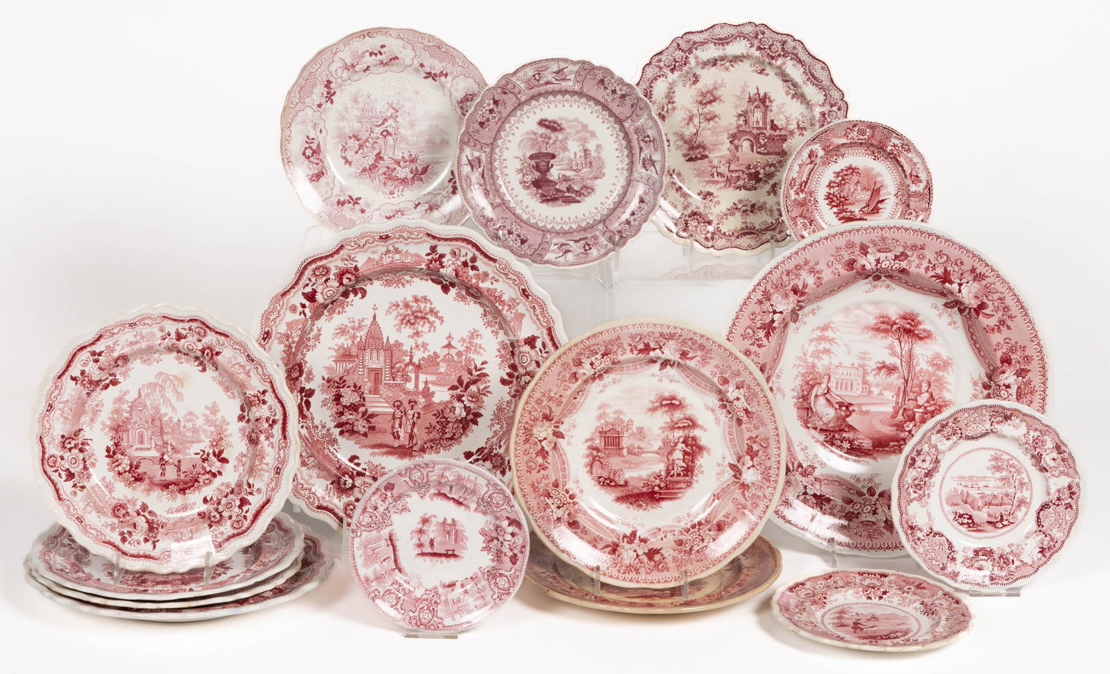 STAFFORDSHIRE TRANSFER-PRINTED PLATES, LOT OF 15: STAFFORDSHIRE TRANSFER-PRINTED PLATES, LOT OF 15,each having red/pink transfers, including patterns India (Temple Warriors) #01, #02, and #08, "RUINS" #04, "BOSPHOURUS", "Andulusia." #06, "CANOVA", "S