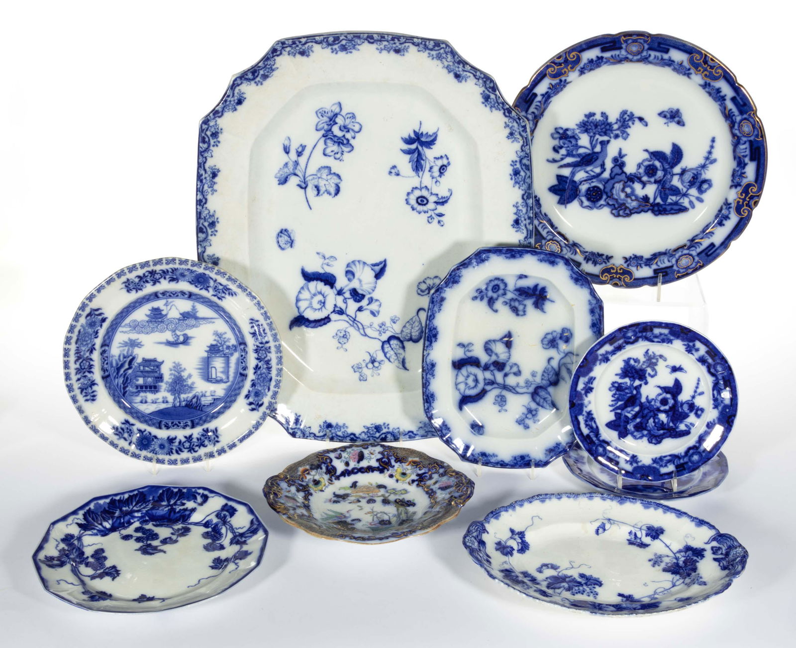 ENGLISH FLOW BLUE FLORAL MOTIF TRANSFER-PRINTED CERAMIC TABLE ARTICLES, LOT OF NINE (1 of 2)