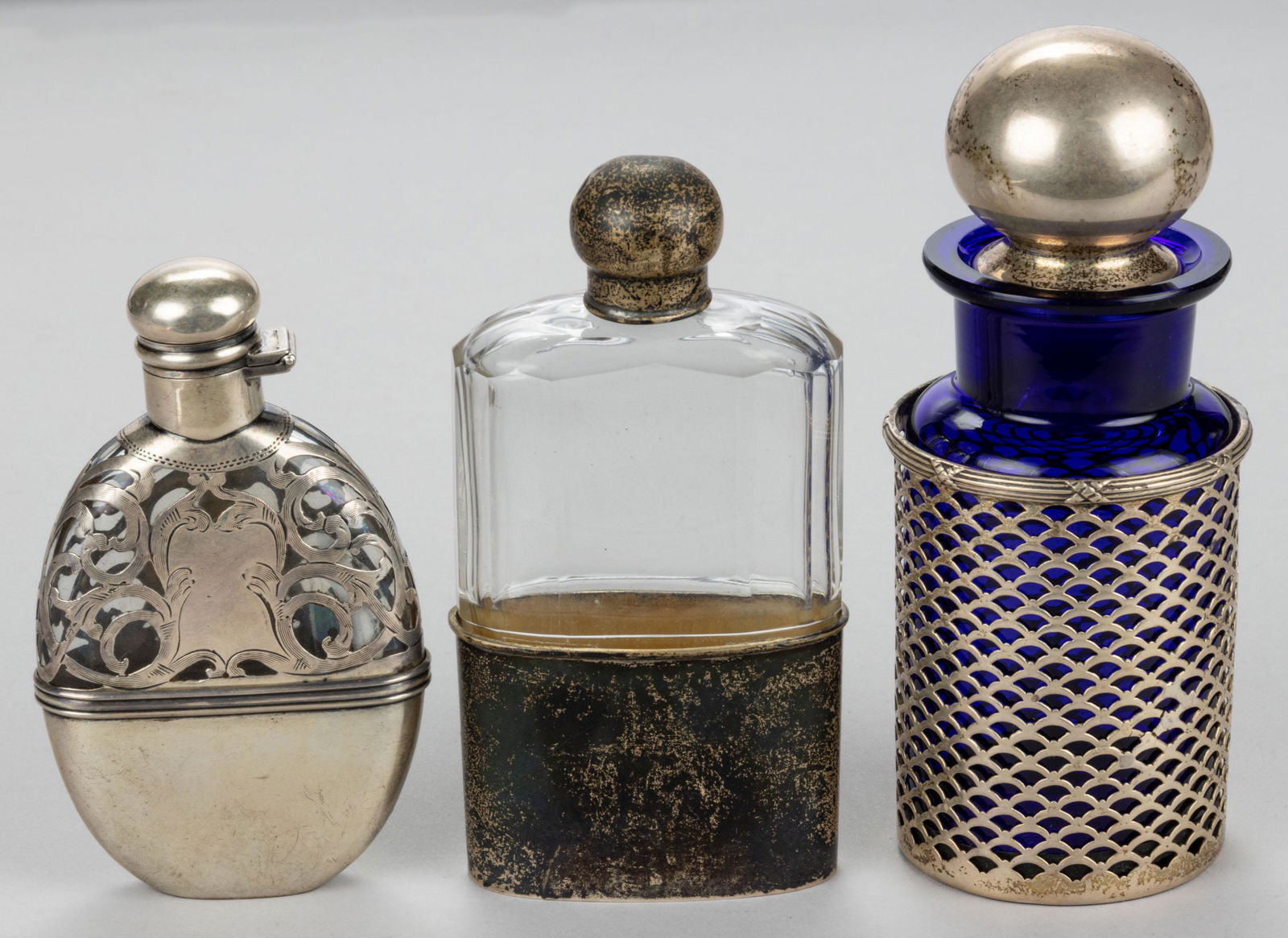 ALVIN AND OTHER STERLING SILVER AND GLASS FLASKS AND BOTTLE, LOT OF THREE (1 of 1)