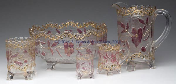 BOHEMIAN / FLORA DORA - MAIDEN'S-BLUSH TABLE ARTICLE: BOHEMIAN / FLORA DORA - MAIDEN'S-BLUSH TABLE ARTICLES, LOT OF FIVE, colorless with gilt decoration, comprising a milk pitcher, berry bowl, spooner, individual creamer and toothpick holder, all raised 