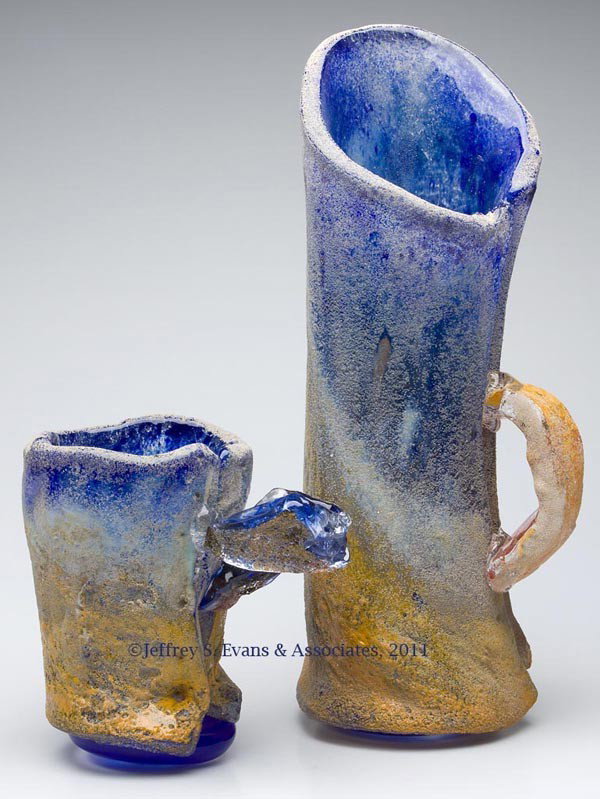 RON STARR SAND CAST STUDIO GLASS SCULPTURES, LOT O: RON STARR SAND CAST STUDIO GLASS SCULPTURES, LOT OF TWO, each formed from a thick rolled sheet, signed and dated 2007. Shipping Note: These sculptures are extremely heavy. 9 1/4" and 20 3/4" H. Proven