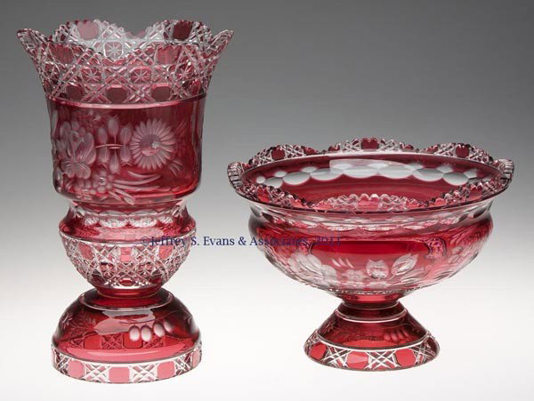 CUT OVERLAY LEAD CRYSTAL VASE AND COMPOTE: CUT OVERLAY LEAD CRYSTAL VASE AND COMPOTE, red to colorless, floral and cane cuttings, each engraved "Meissen" on side. Second half 20th century. 6 1/2" and 11 1/4" H. Provenance: Collection of Bertra