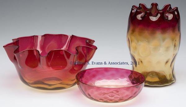 AMBERINA OPTIC PATTERN ARTICLES, LOT OF THREE: AMBERINA OPTIC PATTERN ARTICLES, LOT OF THREE, comprising an Inverted Thumbprint spooner, Diamond-Optic sauce dish, and a lightly ribbed finger bowl, each with a polished pontil mark. W. L. Libbey & S