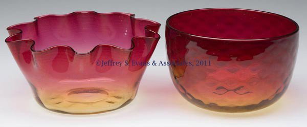 AMBERINA FINGER BOWLS, LOT OF TWO: AMBERINA FINGER BOWLS, LOT OF TWO, comprising an unpatterned example with tooled rim, and a Diamond-Optic example, each with a polished pontil mark. W. L. Libbey & Sons and others. Late 19th/early 20t