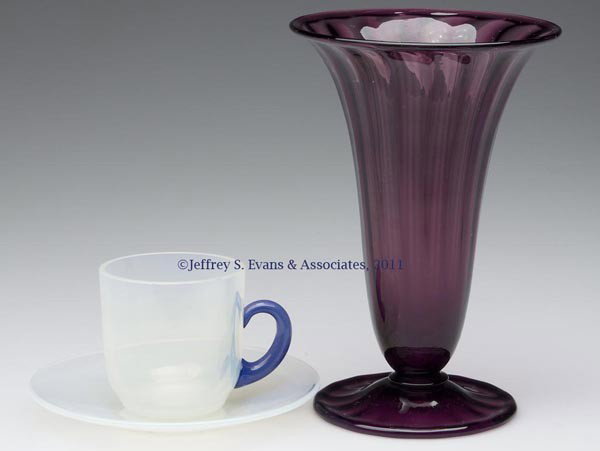 DURAND AND FRY ARTICLES, LOT OF THREE: DURAND AND FRY ARTICLES, LOT OF THREE, comprising a Durand amethyst Optic Ribbed vase with folded rim and foot, and a Fry Foval demitasse cup and saucer, blue handle. First half 20th century. 2 1/4" a