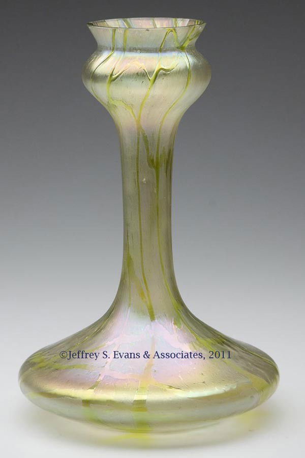 LOETZ-TYPE OIL SPOT VASE: LOETZ-TYPE OIL SPOT VASE, colorless iridized, with green trailings. First quarter 20th century. 10 1/2" H, 7" DOA.