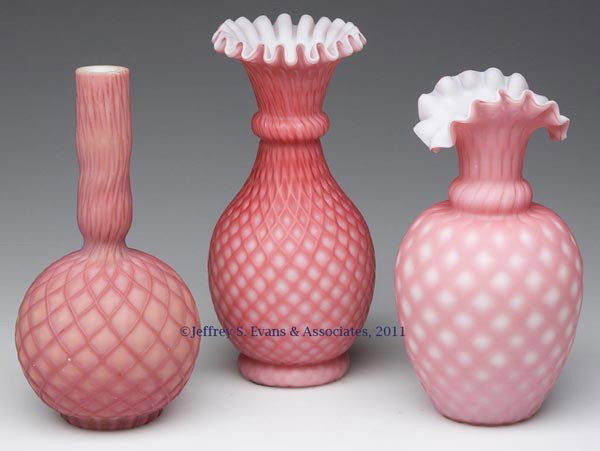 CUT VELVET CASED SATIN GLASS VASES, LOT OF THREE: CUT VELVET CASED SATIN GLASS VASES, LOT OF THREE, shades of rose, one with factory polished rim and two with crimped rim and rough pontil mark. Fourth quarter 19th century. 6 1/4" to 7" H. Provenance: