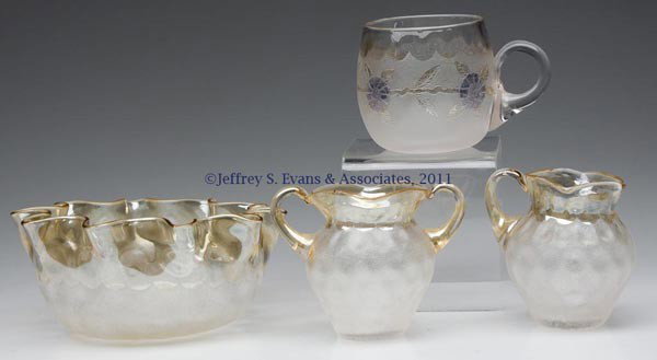 POMONA ARTICLES, LOT OF THREE: POMONA ARTICLES, LOT OF THREE, colorless, comprising a matching individual sugar and creamer with applied handles, and a finger bowl, each being first patent etching and with light iridescence; and a 