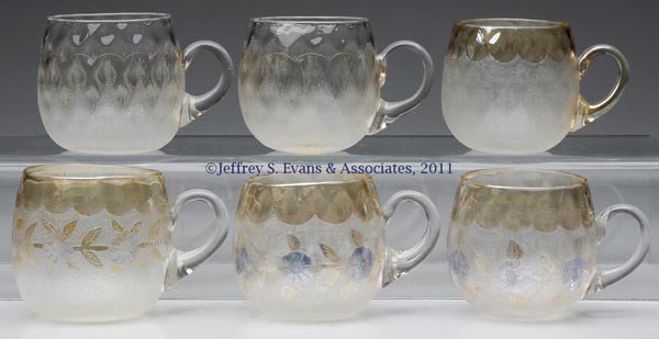 POMONA - FIRST PATENT ETCHING PUNCH CUPS, LOT OF S: POMONA - FIRST PATENT ETCHING PUNCH CUPS, LOT OF SIX, colorless, various designs and optic patterns, each with colorless applied handle and polished pontil mark. New England Glass Co. Fourth quarter 1