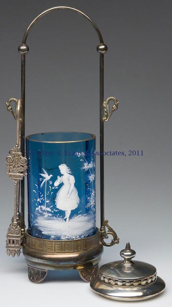 RIB-OPTIC PICKLE CASTER: RIB-OPTIC PICKLE CASTER, blue, with Mary Gregory (so called) decoration featuring a girl with a bird on a perch, fitted in Pairpoint Manufacturing Co. quadruple-plate frame, marked "633", with ill-fit