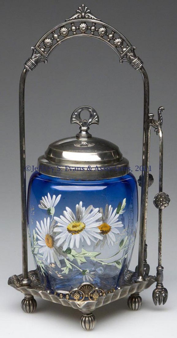 RIB-OPTIC PICKLE CASTER: RIB-OPTIC PICKLE CASTER, shaded blue with polychrome floral and worn gilt decoration, fitted in a James W. Tufts quadruple-plate frame, marked "3395", with cover and tongs. Rim of jar polished during