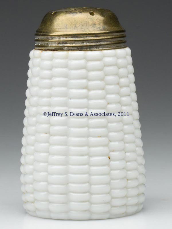 CORN SUGAR SHAKER: CORN SUGAR SHAKER, opaque white/milk glass, period lid. Probably Dithridge Glass Co. Late 19th/early 20th century. 4 5/8" HOA. Provenance: Estate collection of Dorothy and Marshall Jenkins.