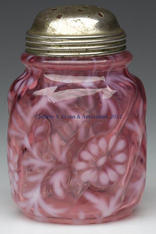 DAISY AND FERN - NORTHWOOD SWIRL MOLD SUGAR SHAKER: DAISY AND FERN - NORTHWOOD SWIRL MOLD SUGAR SHAKER, cranberry opalescent, period lid. Northwood Glass Co. Late 19th/early 20th century. 4 3/8" HOA. Provenance: Personal collection of Judith (Judy) Cro