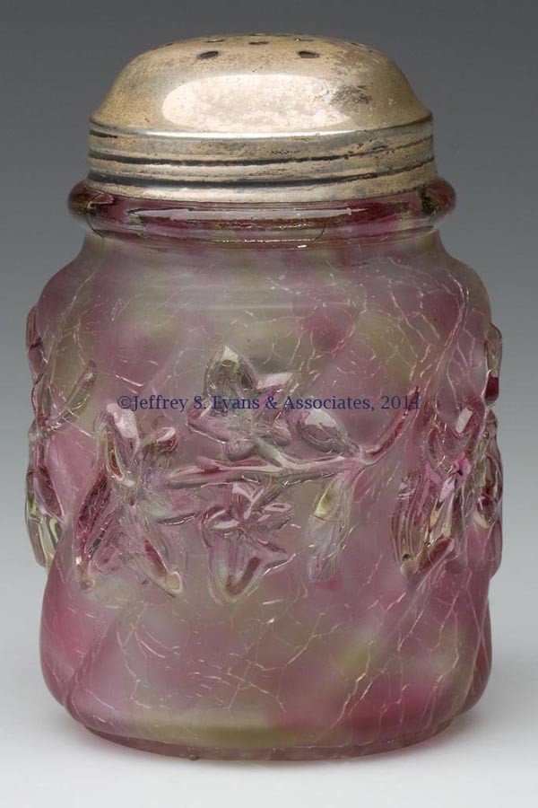 ROYAL IVY SUGAR SHAKER: ROYAL IVY SUGAR SHAKER, rainbow spatter craquelle, satin finish, period lid. Northwood Glass Co. Fourth quarter 19th century. 4 1/4" HOA. Provenance: Personal collection of Judith (Judy) Cronin, Orlea