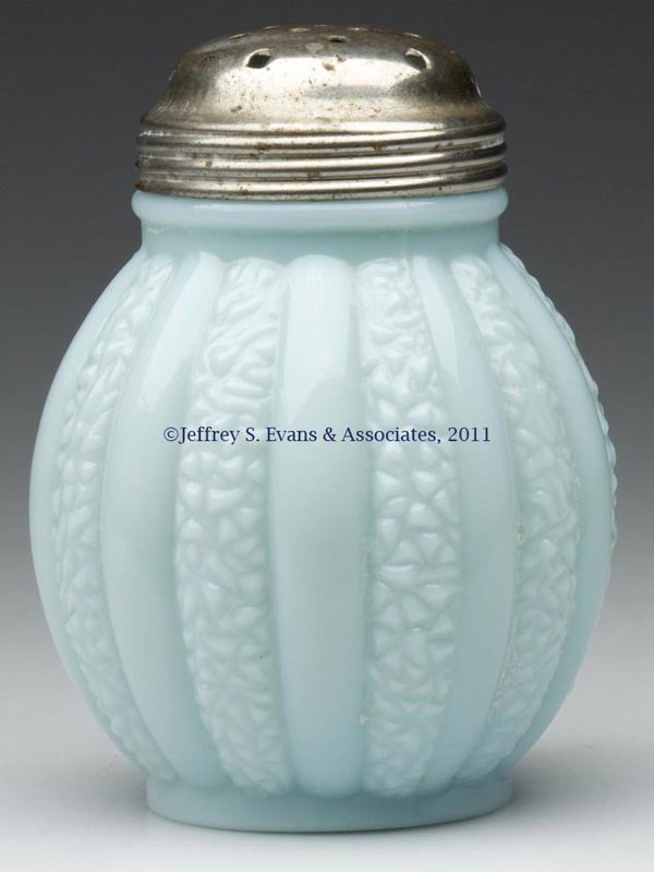 SCROLLED RIB SUGAR SHAKER: SCROLLED RIB SUGAR SHAKER, opaque blue, period lid. Gillinder & Sons. Late 19th/early 20th century. 4 3/8" HOA. Provenance: Estate collection of Dorothy and Marshall Jenkins.