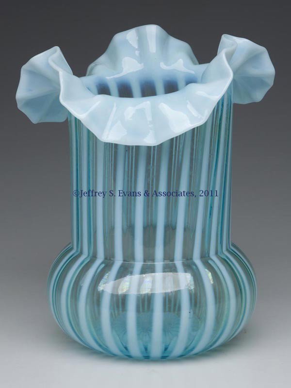 OPALESCENT STRIPE CELERY VASE: OPALESCENT STRIPE CELERY VASE, blue, tooled, ruffled rim. Late 19th/early 20th century. 6" HOA, 4 3/4" DOA.