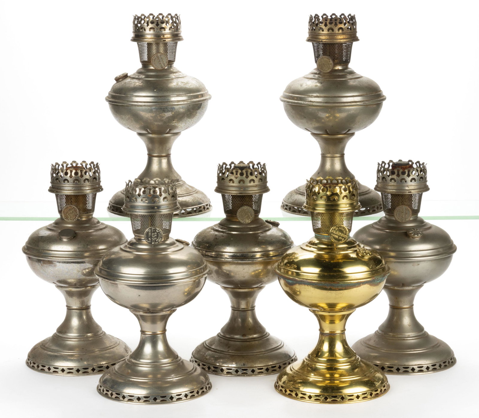 ALADDIN MODEL 6 KEROSENE STAND LAMPS, LOT OF SEVEN: ALADDIN MODEL 6 KEROSENE STAND LAMPS, LOT OF SEVEN, comprising five nickel and a brass example, each fitted with an Aladdin model 6 burner with two having a Model 6 flame spreader, rema