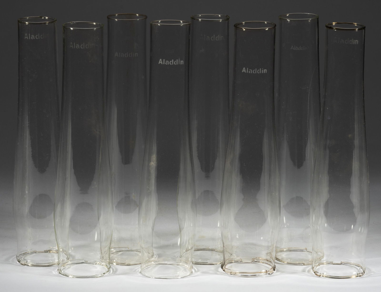 ALADDIN SINGLE-LINE GLASS KEROSENE LAMP LOX-ON CHIMNEYS, LOT OF EIGHT (1 of 1)