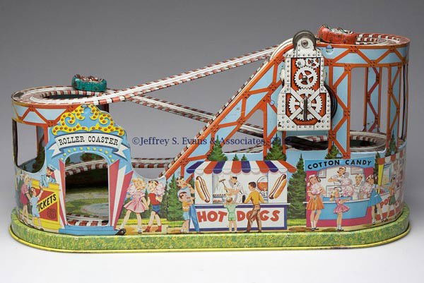 CHEIN "ROLLER COASTER" WIND-UP TIN TOY: CHEIN "ROLLER COASTER" WIND-UP TIN TOY, variation without Side Show, two original cars and belt. Second half 20th century. 10" H, 8 1/4" x 19 1/2". Provenance: Estate collection of Dorothy and Marshal