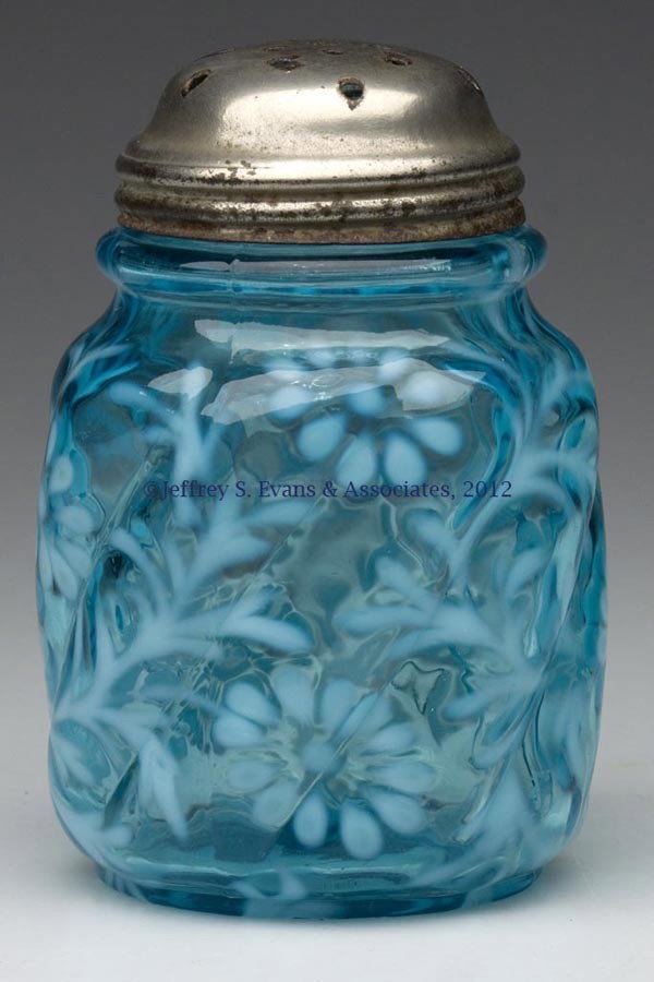 DAISY AND FERN - NORTHWOOD SWIRL MOLD SUGAR SHAKER: DAISY AND FERN - NORTHWOOD SWIRL MOLD SUGAR SHAKER, blue opalescent, period lid. Northwood Glass Co. Late 19th/early 20th century. 4 3/8" HOA. Provenance: Estate collection of Dorothy and Marshall Jen