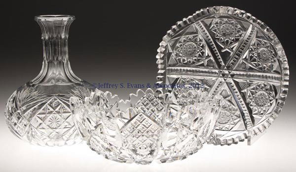 SIGNED AMERICAN BRILLIANT CUT GLASS ARTICLES, LOT : SIGNED AMERICAN BRILLIANT CUT GLASS ARTICLES, LOT OF THREE, comprising a Hawkes water carafe and deep bowl, and a Fry shallow bowl. First quarter 20th century. Carafe 7 1/2" H, 6" DOA, bowls 3 1/4" H,