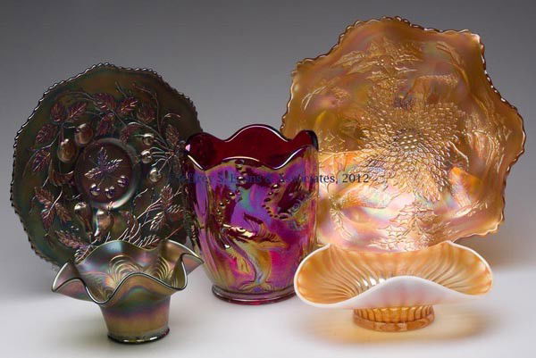 ASSORTED CARNIVAL GLASS ARTICLES, LOT OF FIVE: ASSORTED CARNIVAL GLASS ARTICLES, LOT OF FIVE, including a blue Fenton Three Fruits plate with strong iridescence and a signed Fenton red Atlantis vase. 20th century. Plate 9 1/2" D. Provenance: Estat