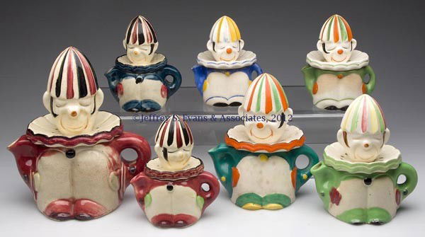 JAPANESE CERAMIC CLOWN REAMERS, LOT OF SEVEN: JAPANESE CERAMIC CLOWN REAMERS, LOT OF SEVEN, polychrome decoration, various marks. First half 20th century. 5" to 8 1/2" HOA. Provenance: Estate collection of Dorothy Gooch, Hopkinsville, KY.
