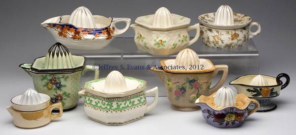 JAPANESE CERAMIC REAMERS, LOT OF NINE: JAPANESE CERAMIC REAMERS, LOT OF NINE, polychrome decoration, various molded and painted designs, mainly floral, various marks. First half 20th century. 3" to 5 1/2" HOA. Provenance: Estate collection