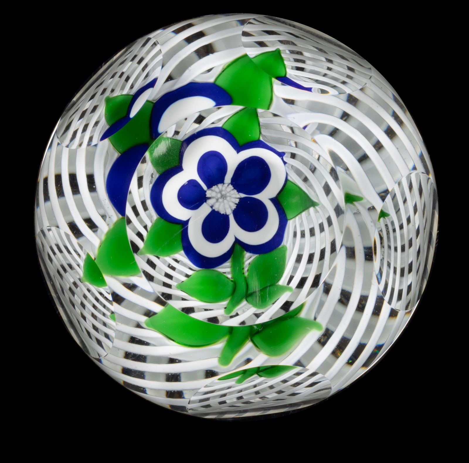 JOHN DEACONS (SCOTTISH, B. 1950) DOGROSE LAMPWORK ART GLASS PAPERWEIGHT, cut-faceted with a central (1 of 2)