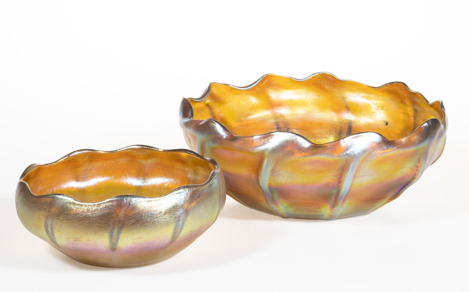 TIFFANY STUDIOS RIBBED IRIDESCENT ART GLASS BOWLS, LOT OF TWO, golden iridescent, each having (1 of 3)