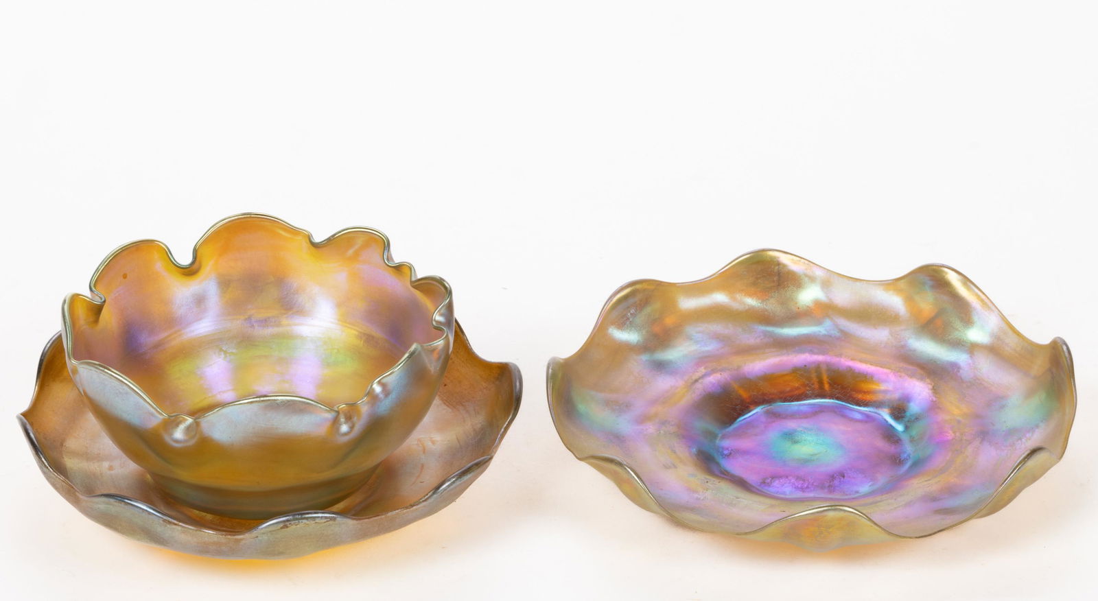 TIFFANY STUDIOS IRIDESCENT ART GLASS TABLE ARTICLES, LOT OF THREE, comprising a bowl and two dishes (1 of 4)