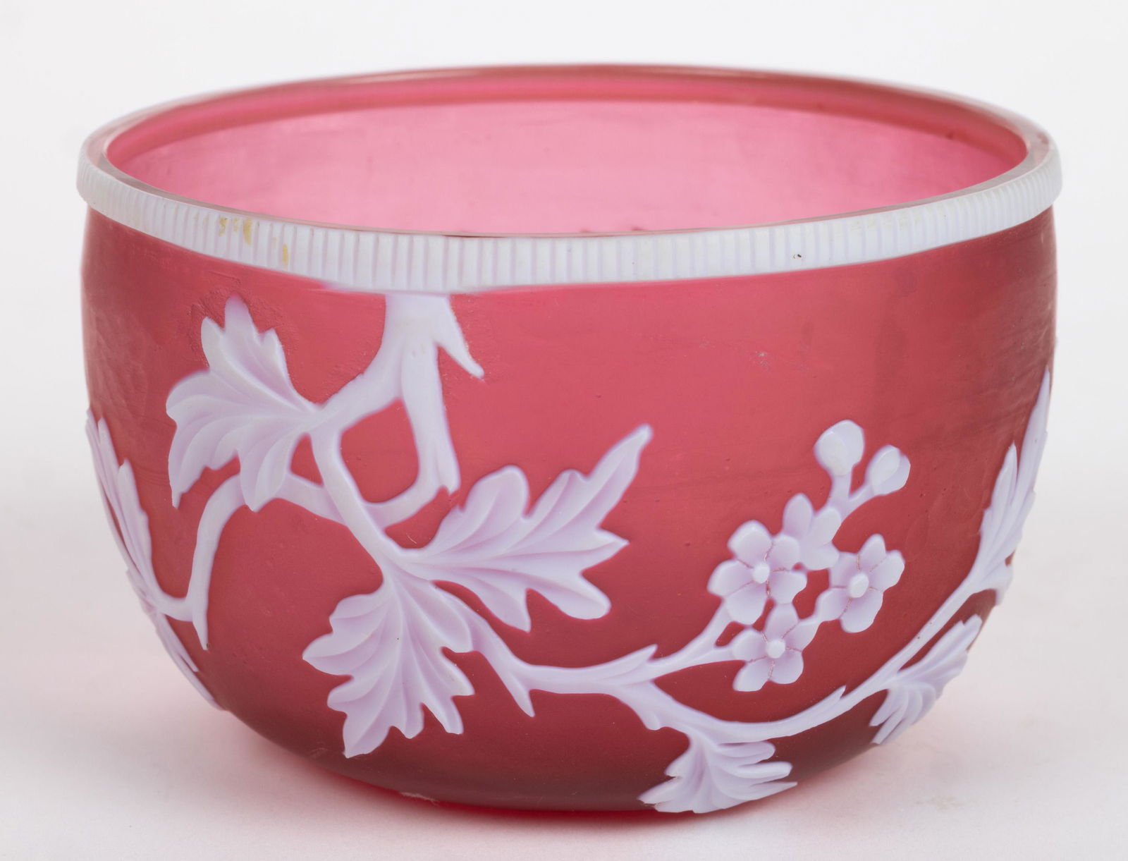 ENGLISH FLORAL CAMEO ART GLASS BOWL, opaque white to red, flowering vine decoration with an applied: ENGLISH FLORAL CAMEO ART GLASS BOWL, opaque white to red, flowering vine decoration with an applied rim at the top, polished pontil mark. Thomas Webb & Sons or Stevens & Williams. Fourth quart