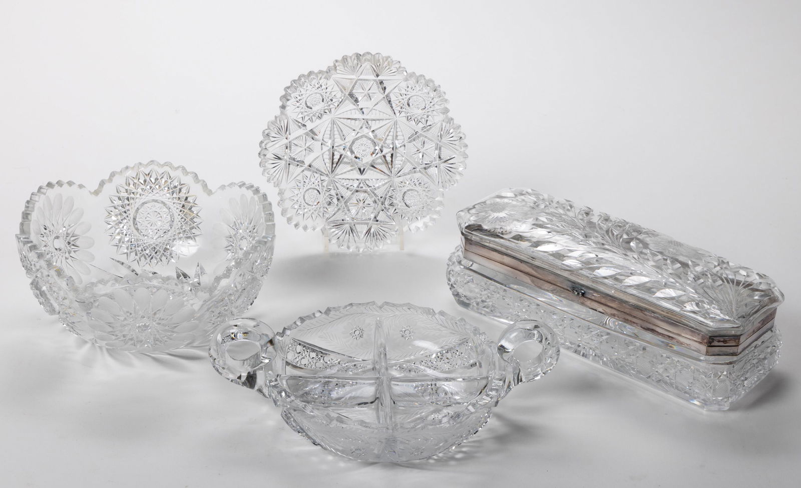ASSORTED CUT GLASS ARTICLES, LOT OF FOUR, including a rectangular floral cut dresser box, a floral (1 of 5)
