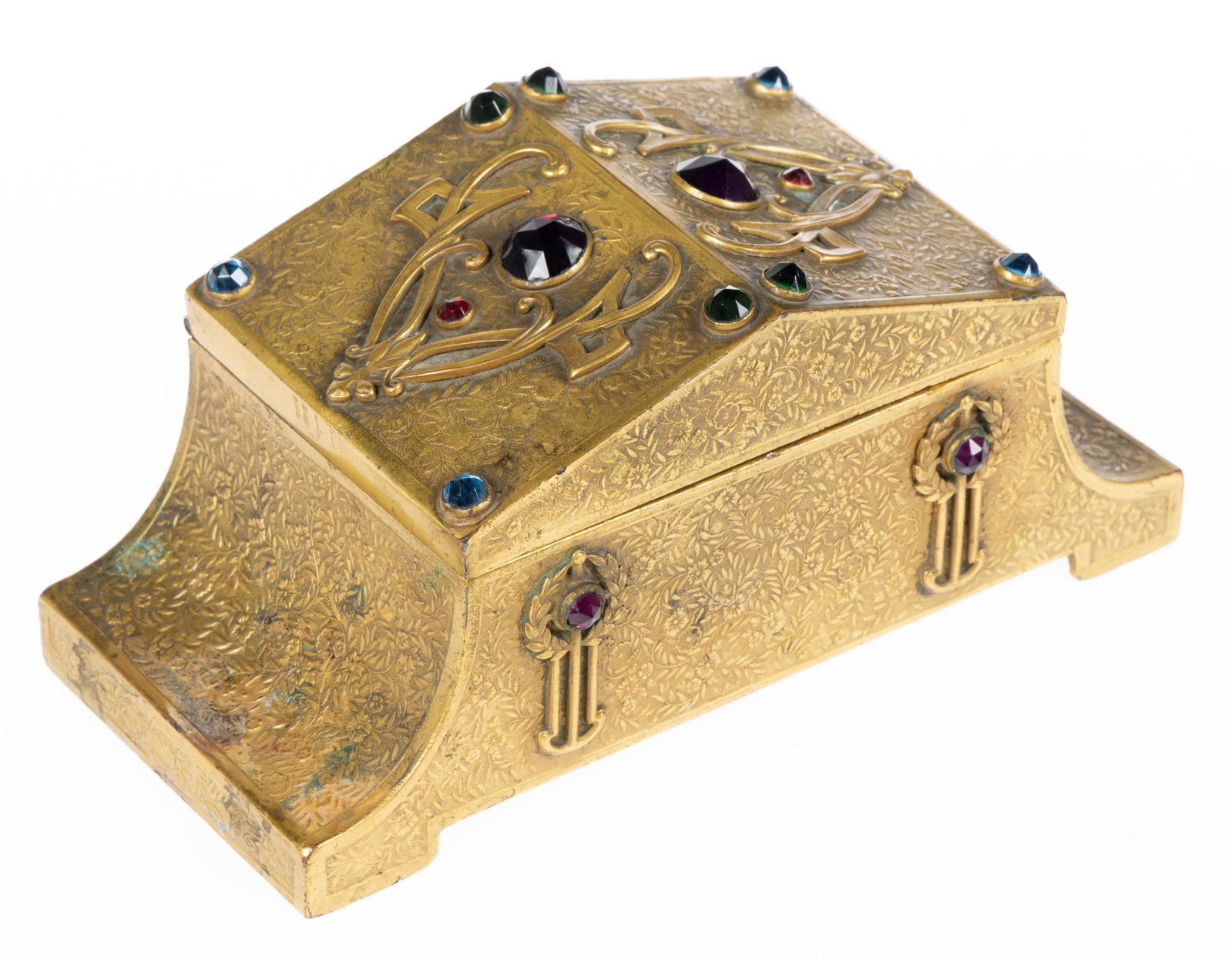 ART NOUVEAU GILT-BRONZE JEWEL CASKET, embossed floral ground with applied ornaments and: ART NOUVEAU GILT-BRONZE JEWEL CASKET, embossed floral ground with applied ornaments and colored-glass jewels, velvet lined interior. No markings located. First quarter 20th century. 3" H, 6 3/8&q